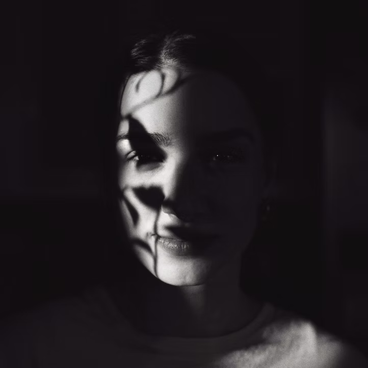 Low-key portrait in shadow